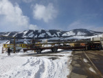 The longest of the three trucks carried the post.