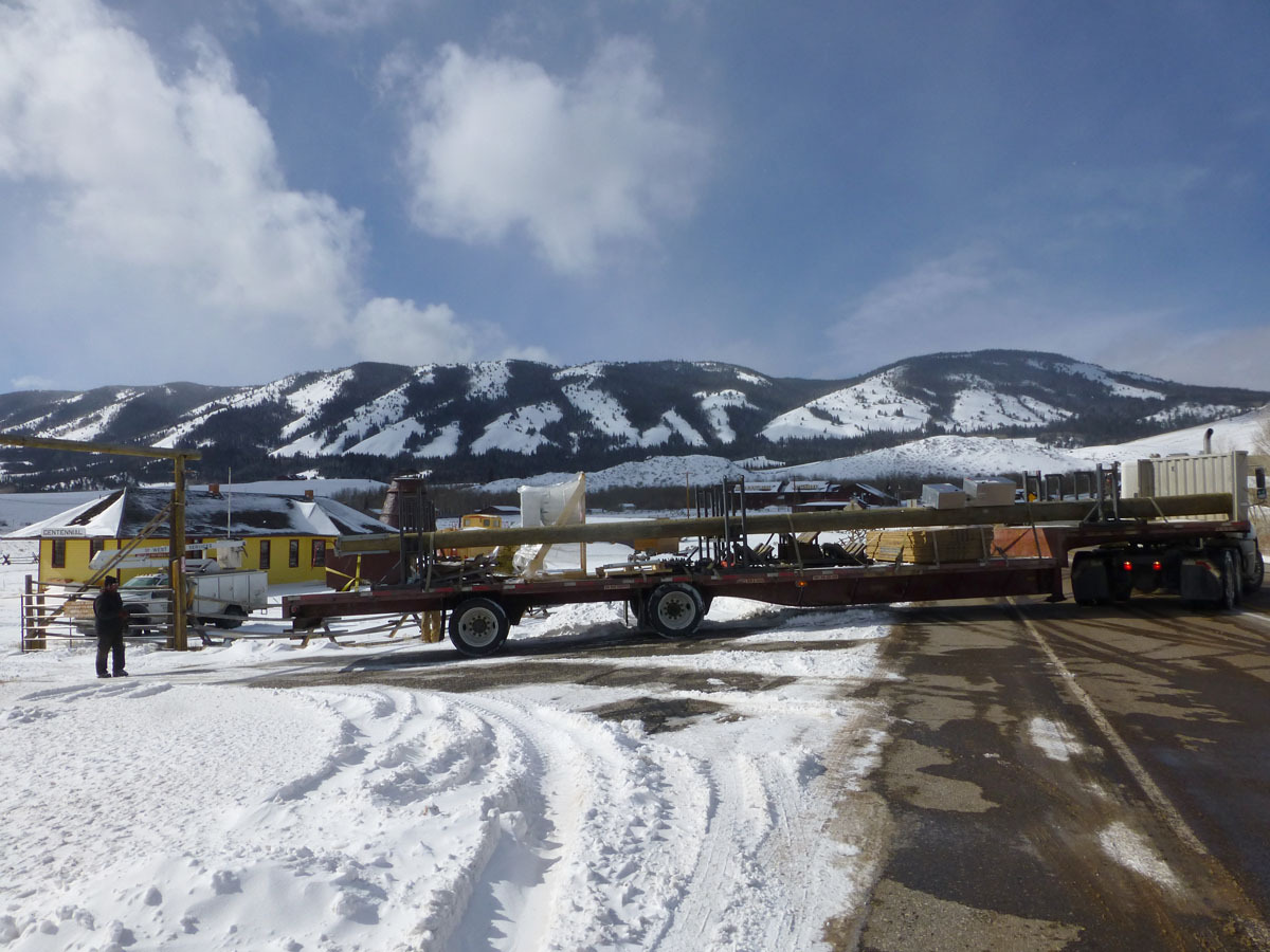 The longest of the three trucks carried the post.