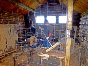 One student and a faculty member attacked the critter holes in the blacksmith shop